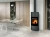 Piec stalowy Romotop Sone G H Metal w salonie